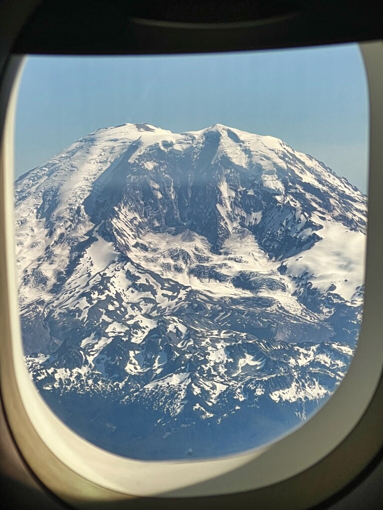 Mount Rainier through a plane window